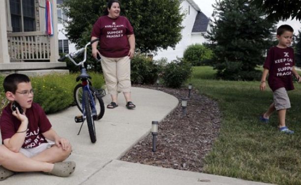 Matthew, à gauche, est X fragile - le 22 juillet 2013, à Plainfield, dans l'Illinois (C.BERMAN/SIPA).