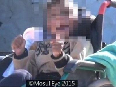 Un enfant_en_fauteuil_et_trisomique_qui_serait_menacee_de_mort_par_l_Etat_islamique